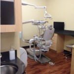 Dental patient chair at {PRACTICE_NAME}